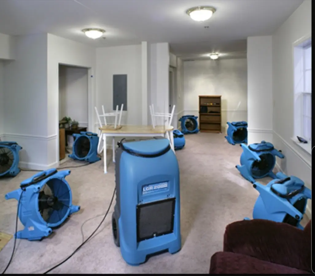 Air movers and dehumidifier setup for Water Damage Restoration in International Falls